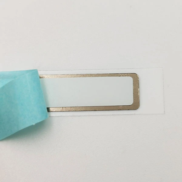 Elektropioitu liima -metallimerkki