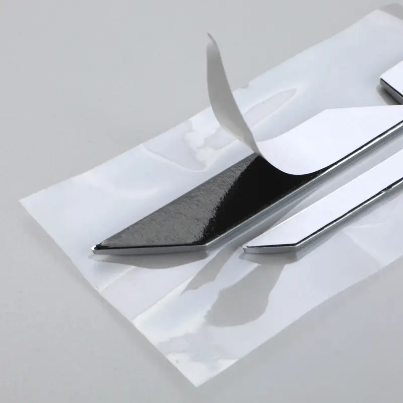 Itseliimautuva kromi ABS 3D -merkki